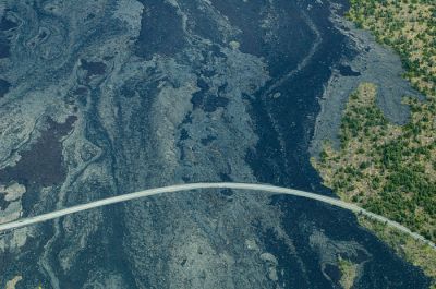 Road through lava field
